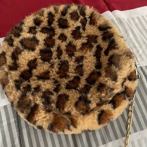 Cheetah print crossbody bag.